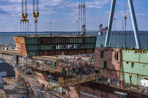 تقوم شركة نيوبورت نيوز لبناء السفن حالياً ببناء حاملة الطائرات التي تعمل بالطاقة النووية جون إف كينيدي (CVN 79) لصالح البحرية الأمريكية (تصوير: جون وايلن / إتش آي)