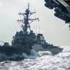 Arleigh Burke-class guided-missile destroyer USS Russell (DDG 59) sails alongside Nimitz-class aircraft carrier USS Theodore Roosevelt (CVN 71), July 13, 2024. (Photo: U.S. Navy)