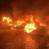 A 36-foot fishing vessel ablaze near Dauphin Island, Ala. (U.S. Coast Guard photo)