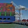 A boxship discharges cargo at the Port of Oakland (c) Port of Oakland