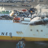 A fire boat directing water onto the Grande Costa D’Avorio. (Source: NTSB)