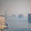 A parade of deep draft vessels proceed in the Suez Canal (c) AdobeStock / Hladchenko Viktor