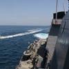 Iranian Islamic Revolutionary Guard Corps Navy (IRGCN) vessels approach U.S. Military ships in international waters of the North Arabian Gulf. (U.S. Navy photo)