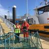 Captain Jeff Gaskin, Aberdeen Harbour Master, and Adam Ezzamel, EOWDC Project Director, Vattenfall, on the new pontoon Photo Aberdeen Harbor )