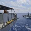 Civilian Mariner Kevin Sauls, Ship's master aboard the Henry J. Kaiser-class fleet replenishment oiler USNS Guadalupe (T-AO 200), observes the Royal Navy Duke-class frigate HMS Montrose (F 236) during a replenishment-at-sea drill. Guadalupe is conducting operations, providing logistical support to U.S. Navy and allied forces operating in the U.S. 7th Fleet area of responsibility. (U.S. Navy photo by Mass Communication Specialist 2nd Class Tristin Barth)