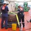Coast Guard marine safety engineers conduct a survey of the aft titanium endcap from Titan in the North Atlantic Ocean October 1, 2023. (Photo: U.S. National Transportation Safety Board)