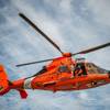 File photo: an MH-65 Dolphin helicopter aircrew from Coast Guard Air Station New Orleans (U.S. Coast Guard photo by Travis Magee)