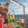 Fire Protection: Staff aboard a floating producer pass several coatings types. (Photo: Øyvind Hagen, Statoil)