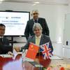 From right to left: Andrew Marshall, CEO Coldharbour Marine Ltd (seated) and Graham Cole CBE, Chairman, Coldharbour Marine Ltd (standing). On the left, Jason Lee, General Manager, Hansun (Shanghai) Marine Technology (seated) and Simon Gu, Chairman, Hansun (Shanghai) Marine Technology (Photo: Coldharbour Marine)