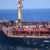 Indian naval forces seized the Maltese-flagged bulk carrier Ruen that had been hijacked by Somali pirates, rescuing 17 crew members. All 35 pirates aboard the ship surrendered. (Photo: Indian Navy)