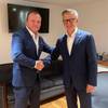 Ioakeim Tsanis, CEO of Hellenic Radio Services and Erik Ceuppens, CEO Marlink Group, shake hands on Marlink's acquisition of the satellite communications business of Hellenic Radio Services. - Credit: Marlink