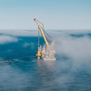 Jan De Nul’s heavy-lift vessel Les Alizés installing the first monopile at Thor (Credit: RWE)