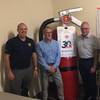New Resolve Partners Chauncey Naylor (director of the Resolve Academy), Stacy Payne (Resolve) and Glyn Day and Neil Cooper both with Fire Ranger.
The Large Fire Extinguisher is called Big Red. (Image: Resolve Marine)