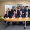 Nikolay Kolesnikov, Senior Executive Vice-President and CFO of Sovcomflot (sitting in the centre) together with the signees from KfW IPEX-Bank, Credit Agricole, ING Bank, Societe Generale, Citibank, UniCredit, and DVB Bank (sitting, from left to right). Photo: Sovcomflot