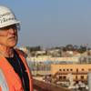One-on-one with David M. Thomas, Jr. standing atop the wingwall of one of two drydocks in service at BAE System’s San Diego shipyard.
Photo: BAE Systems/Maria McGregor