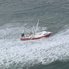 Photo by Petty Officer 3rd Class Isaac Cross,
U.S. Coast Guard District 5 North