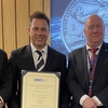 Pictured from left, Marius Fenger, Brad Lucas Australian Maritime Safety Authority CEO Mick Kinley, Alex Alsop. (Image courtesy of AMSA)