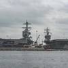 The aircraft carrier Pre-Commissioning Unit (PCU) Gerald R. Ford (PCU 78), left, and USS Dwight D. Eisenhower (CVN 69) sit pierside at Naval Station Norfolk. (U.S. Navy photo by Nathan T. Beard)