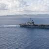 The aircraft carrier USS Theodore Roosevelt (CVN 71) returns to operations in the Philippine Sea on May 21 following an extended visit to Guam in the midst of the COVID-19 global pandemic. (U.S. Navy photo by Kaylianna Genier)