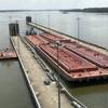 The M/V Steve Golding transits through the Olmsted Locks in late July. Called by some stakeholders, 'the Manhatten Project' of civil engineering, Olmsted is finally completed at an enormous cost. (CREDIT: USACE)