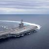The Nimitz-class aircraft carrier USS Abraham Lincoln (CVN 72) conducts high-speed turn drills in the Atlantic Ocean during sea trials. Photo: United States Navy