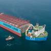 The sound part of the vessel Maersk Honam, which was hit by a serious fire last year, is being transported to Hyundai Heavy Industries Shipyard in South Korea, where it will be rebuilt. Photo: Maersk
