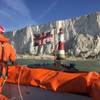 The UK Department of Transport is to order new vessel for Trinity House to replace the THV Patricia and provide safety information and guidance for ships in UK waters and abroad.
A Trinity House workboat approaching Beachy Head Lighthouse on the south coast of England. Trinity House’s fleet of support vessels carries out a number of activities around England, Wales and the Channel Islands in support of its role as a General Lighthouse Authority.
(Photo: Trinity House)