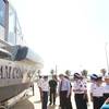 US Ambassador Ted Osius, fourth from left, inspects new Metal Shark patrol boats with Vietnam Coast Guard members during a delivery ceremony Monday May 22, 2017 in Quang Nam, central Vietnam (Photos courtesy US Embassy Hanoi)