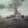 USCG Cutter Sapelo and the Royal Netherlands Navy Offshore Patrol Vessel HNLMS Holland search Caribbean Sea waters for bales of contraband jettisoned by Dominican drug smugglers.