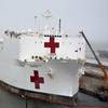 USNS Comfort (T-AH 20) takes on fuel and supplies at Naval Station Norfolk, Va. in preparation to deploy to New York in support of the nation’s COVID-19 response efforts and will serve as a referral hospital for non-COVID-19 patients currently admitted to shore-based hospitals. (U.S. Navy photo by Jim Kohler)