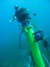 A diver completes the installation of Sentinel sonar heads and Scylla underwater loudhailers.