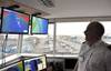 “A Harbour Control Officer using GeoVS’ 3D vessel management system in Poole”.
