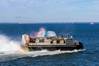 A landing craft air cushion assigned to Assault Craft Unit 4, exits the well deck of the San Antonio-class amphibious transport dock USS San Antonio (LPD 17) while in port. Photo by US Navy/Savannah Hardesty
