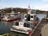 A new 45-foot response boat (right) is moored at Coast Guard Station Marblehead, Ohio, after the station's crew accepted it May 1, 2014. (U.S. Coast Guard photo by Phillip Null)