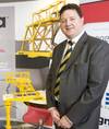 Alistair Dornan, President and Chief Executive Officer of Sigma Offshore, next to a scale model of the company’s SMS innovation (Photo: Sigma Offshore). 
