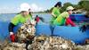 ASC volunteers bagged recycled oyster shells, then placed them in Galveston Bay to form new oyster reefs. Photo: Aramco Services Company (ASC)