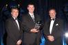 Austal’s Richard Williams (center) accepts AMTIL’s Advanced Manufacturer of the Year award from Major Sponsor Deloitte’s Tom Imbesi (left) and AMTIL CEO Shane Infanti.