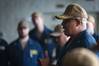 Capt. Lenard Mitchell, commanding officer of the expeditionary sea base USS Hershel "Woody" Williams (ESB 4) addresses the crew during an All Hands Call in the hangar bay. (Photo: Ridge Leoni / U.S. Navy)
