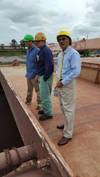 Chairman Cordero (R) observes vessel discharge operations.