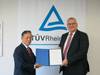 ClassNK Chairman and President, Koichi Fujiwara, handing over the appointment certificate to TÜV Rheinland’s Executive Vice President Products, Holger Kunz (Photo: ClassNK)