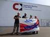 CMSD employees (left to right) Antonio Larrios Jr., Leander Hill, Robert Cooley and Anita Garcia display the VPP flag that was presented when the work site was awarded "star" status by OSHA.