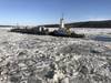 Coast Guard Cutter Penobscot Bay helps break free tug Brooklyn from the ice on the Hudson River near Saugerties, N.Y. (U.S. Coast Guard photo by Steven Strohmaier, courtesy of Coast Guard Cutter Penobscot Bay)