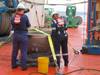 Coast Guard marine safety engineers conduct a survey of the aft titanium endcap from Titan in the North Atlantic Ocean October 1, 2023. (Photo: U.S. National Transportation Safety Board)
