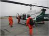 Coast Guard R&D Center researchers board a helicopter as they prepare to evaluate remote Alaskan sites to establish a communications relay network. (U.S. Coast Guard photo by Coast Guard Research & Development Center staff)