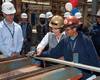 Congresswoman Susan Davis measures the first piece of steel for the fourth American Petroleum Tanker. (Photo: General Dynamics NASSCO)