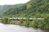 File Image: A typical Crude Oil train in the United states makes its way south along inalnd waterways. CREDIT: Dagmar Etkin