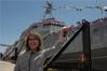 Former U.S. Rep. Gabrielle Giffords waves to a crowd in front of the littoral combat ship, USS Gabrielle Giffords (LCS 10), during the ship’s christening ceremony on June 13, 2015. US Navy photo.
