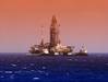 Illustration; An offshore vessel near a drilling rig in the Gulf of Mexico - Credit: flyingrussian
