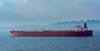 Illustration only - Crude oil tanker in front of Qingdao coastline - Credit: Igor Groshev - AdobeStock