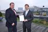 Jörg Lampe (Right), Senior Project Engineer Risk & Safety and Systems Engineering at DNV GL, presented the award to JĂŒrgen Kudritzki (Left), Technical Director at E.R. Schiffahrt, in Hamburg.
